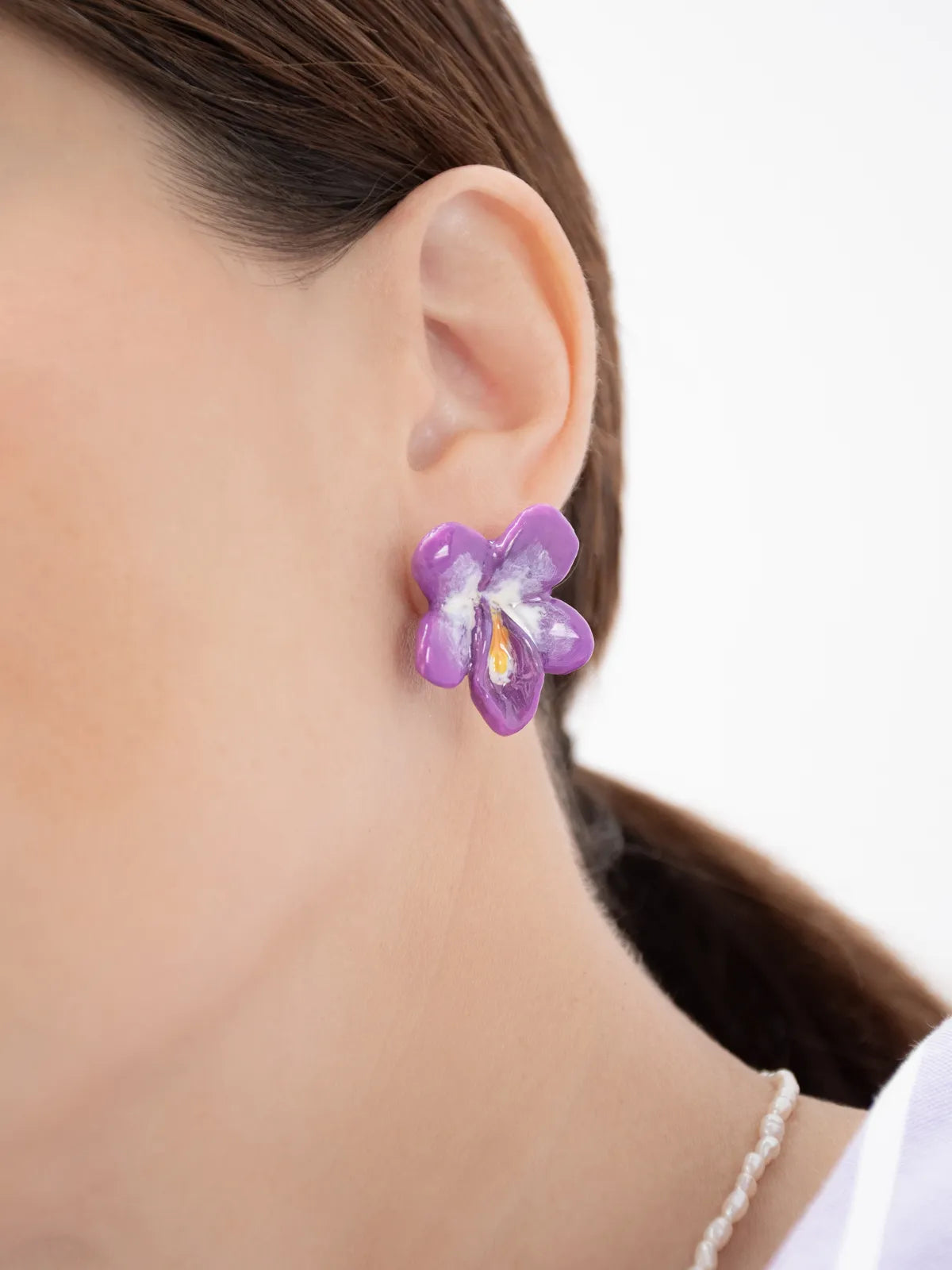 Puces d'oreilles violette