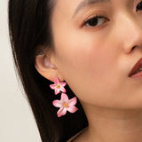 Boucles d’oreilles pendantes double lys roses