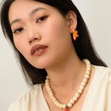 Boucles d'oreilles puces -  demi fleur de lys tigrée