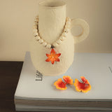 Collier perles fleur de Lys Tigrée