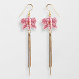 Pink orchid earrings with fringes