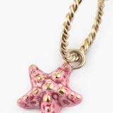 Mini pink starfish hoop earring - Sold individually