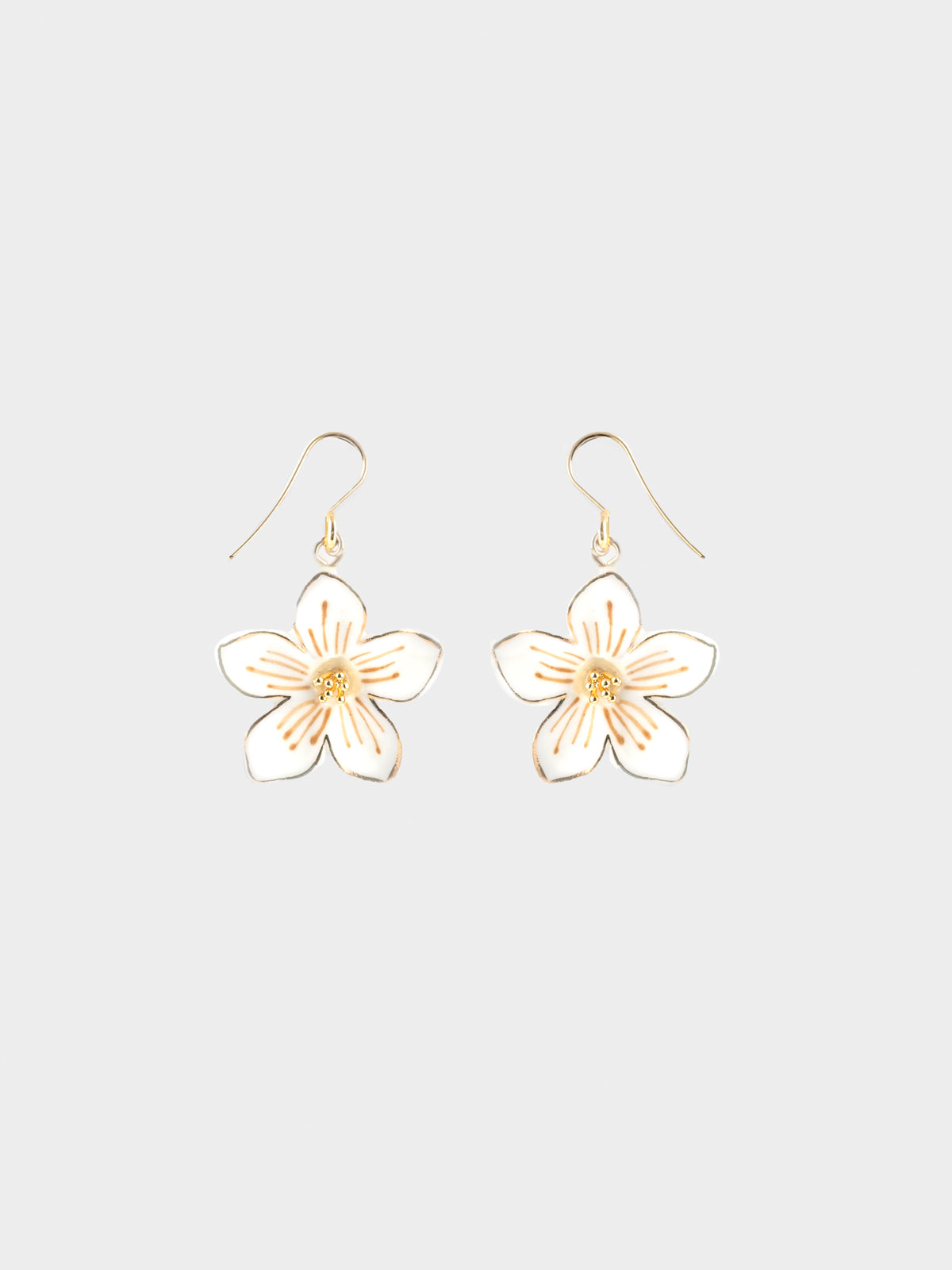 Boucles d'oreilles pendantes fleur blanche