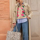 Sleeveless vest embroidered with anemones