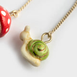 Long mushroom and snail earrings