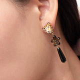 Boucles d'oreilles pendantes léopard et fleur d'Erine