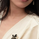 Broche fleur d'Erine et léopard