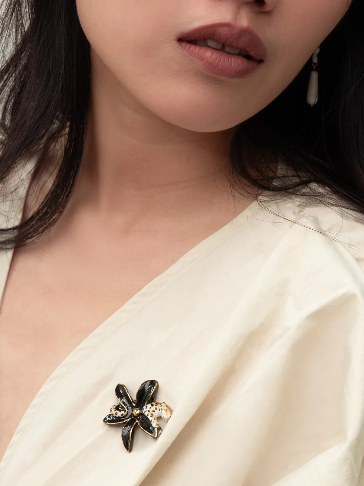 Pin's fleur d'Erine et léopard