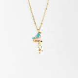 Collier oiseau sur branche et fleur