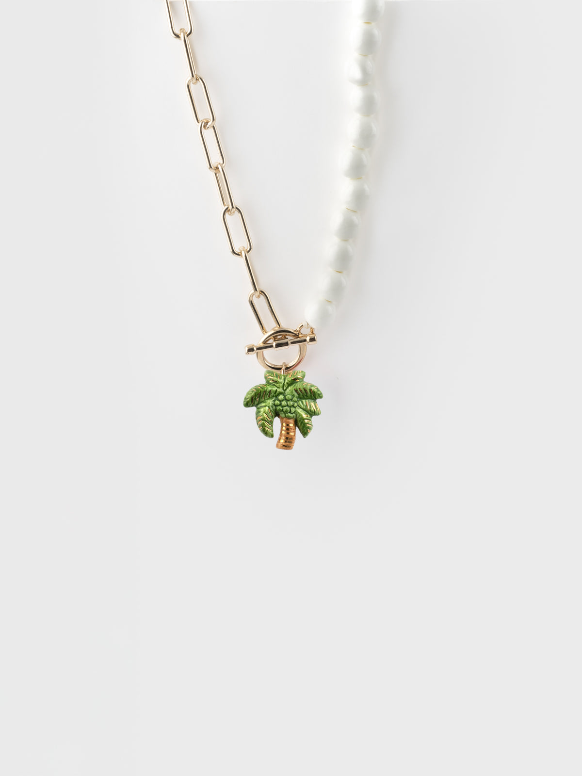 Collier perles et palmier