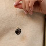 Black snail necklace