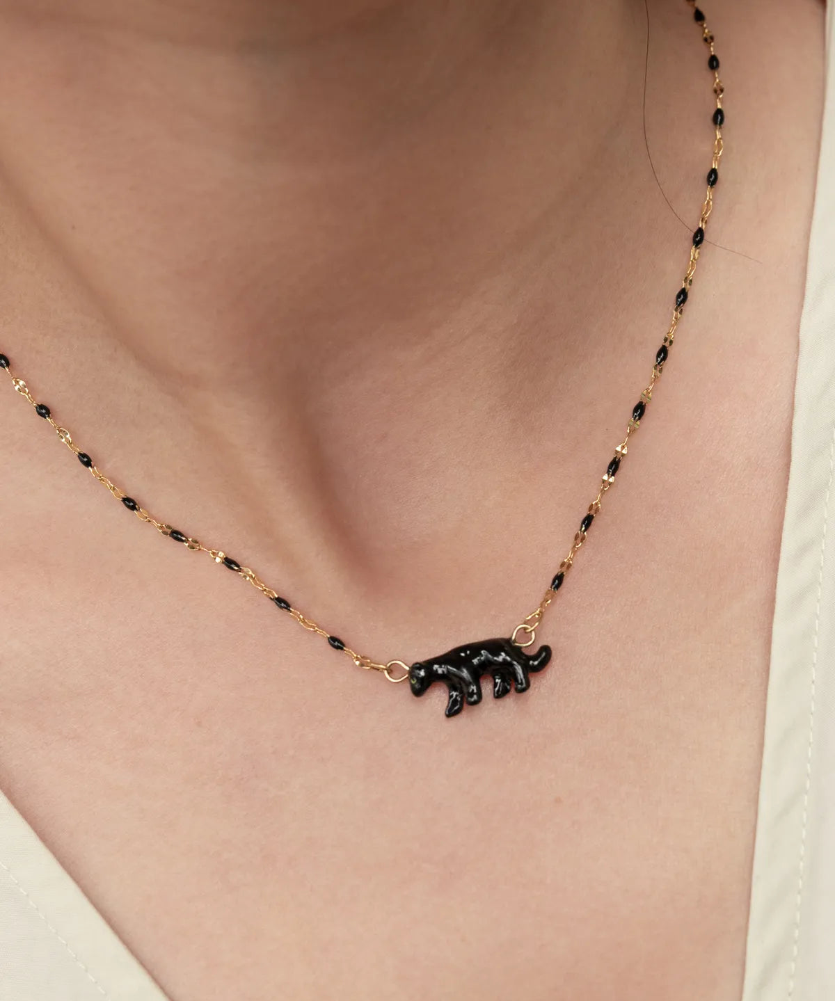 Collier perles et panthère