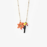 Collier lys et toucan