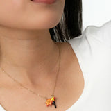 Collier lys et toucan