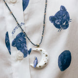 Collar de perlas con luna y búho