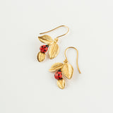 boucles d'oreilles dorées feuille et coccinelle nach
