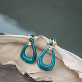 Boucle d'oreilles goutte ovale porcelaine bleu fait main oiseau animal