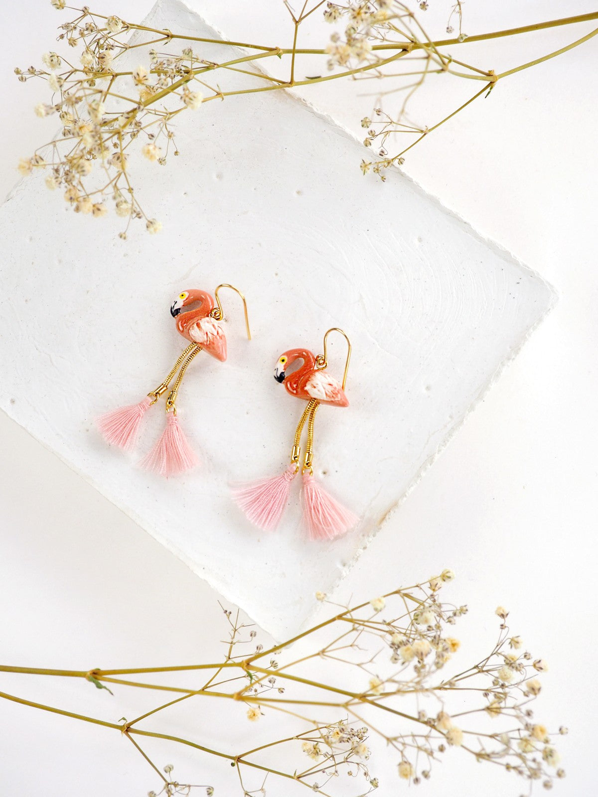 Boucles d'oreilles pompons flamant rose