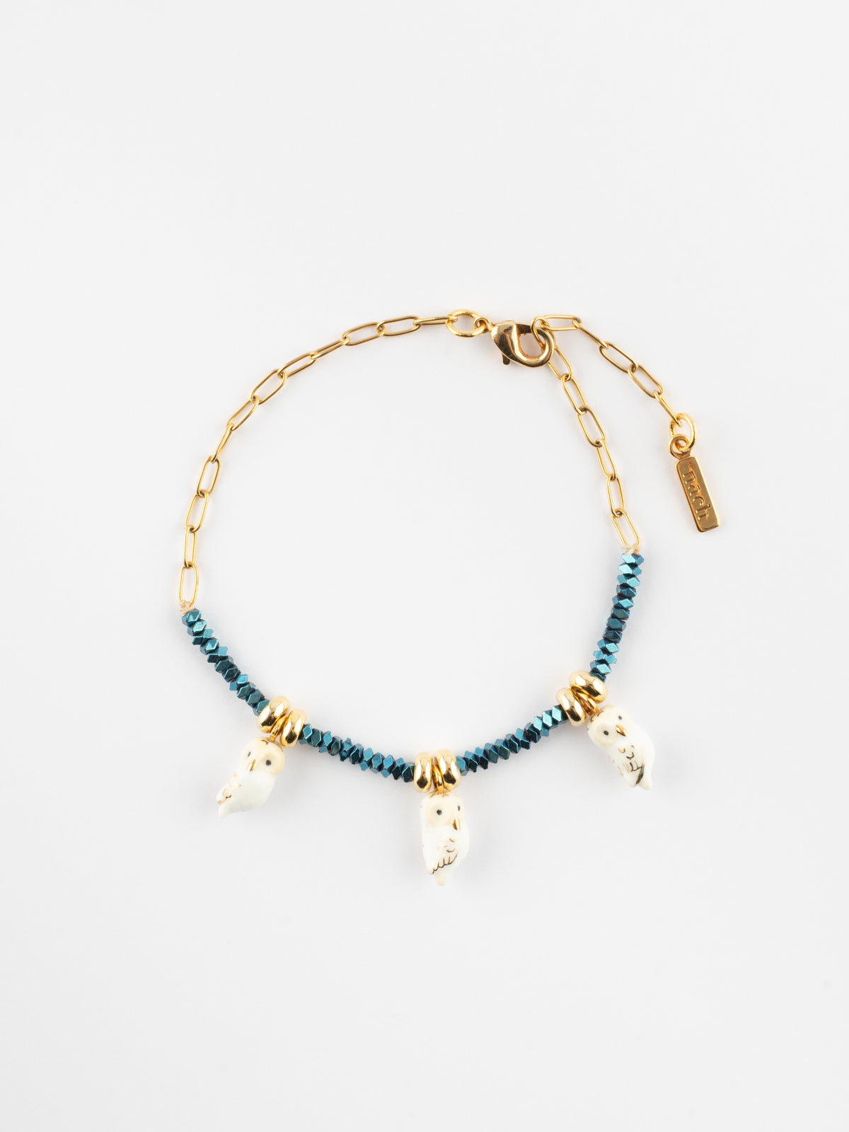 Bracelet en perles d'hématite et chouette