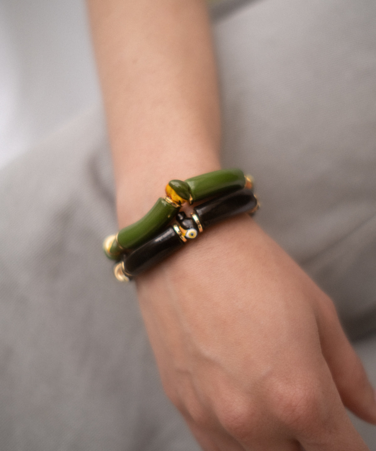Bracelet perles noires toucan