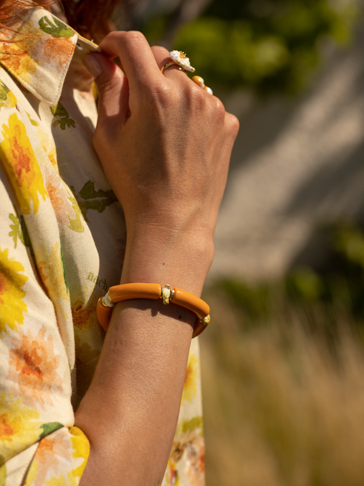 Bracelet perles orange perruche