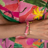 Bracelet perles roses cacatoès