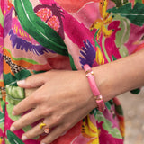 Bracelet perles roses cacatoès