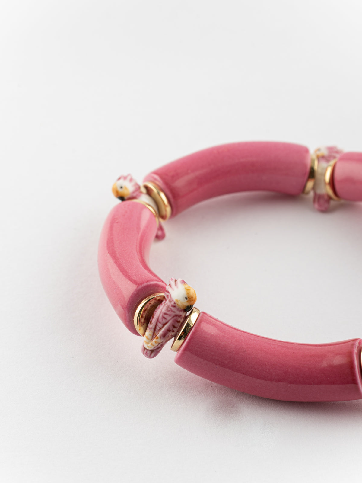 Bracelet perles roses cacatoès