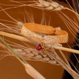 Bracelet élastique orange brillant coccinelle