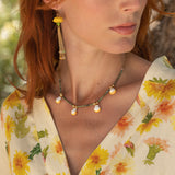 Collier perles d'hématite coquillages