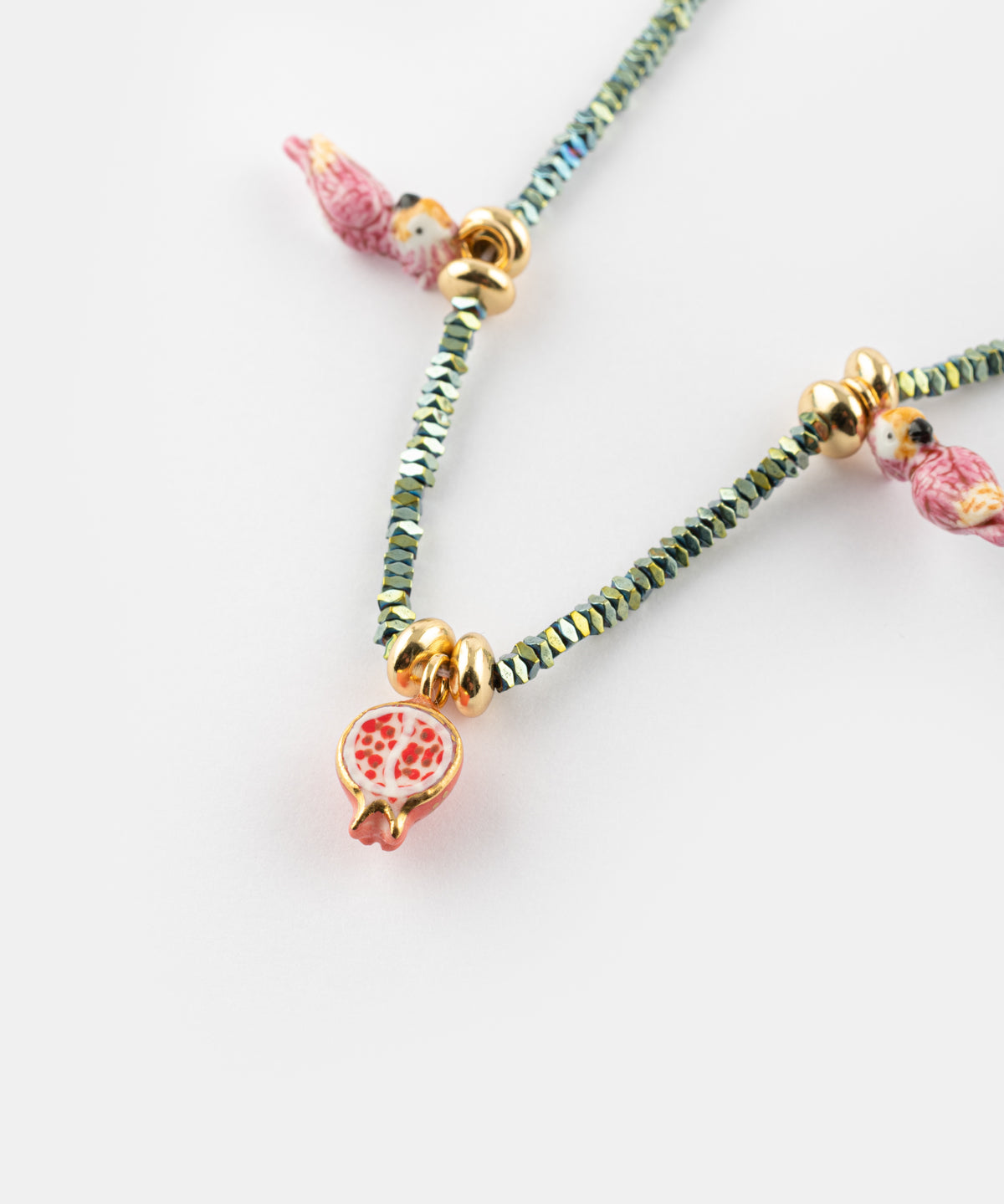 Collier perles d'hématite perruches & grenades