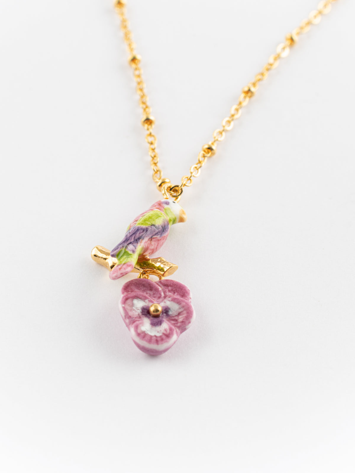 Collier perroquet et pensée