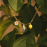 collier doré citron fleur perroquet oiseau bleu jaune porcelaine
