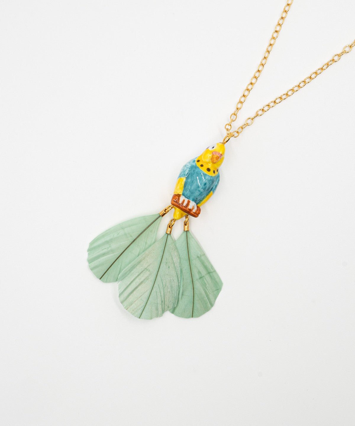 collier doré perruche bleue jaune perroquet oiseau plumes citron porcelaine