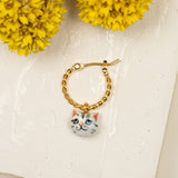 mini créole dorée tête de chat gris charms pampille