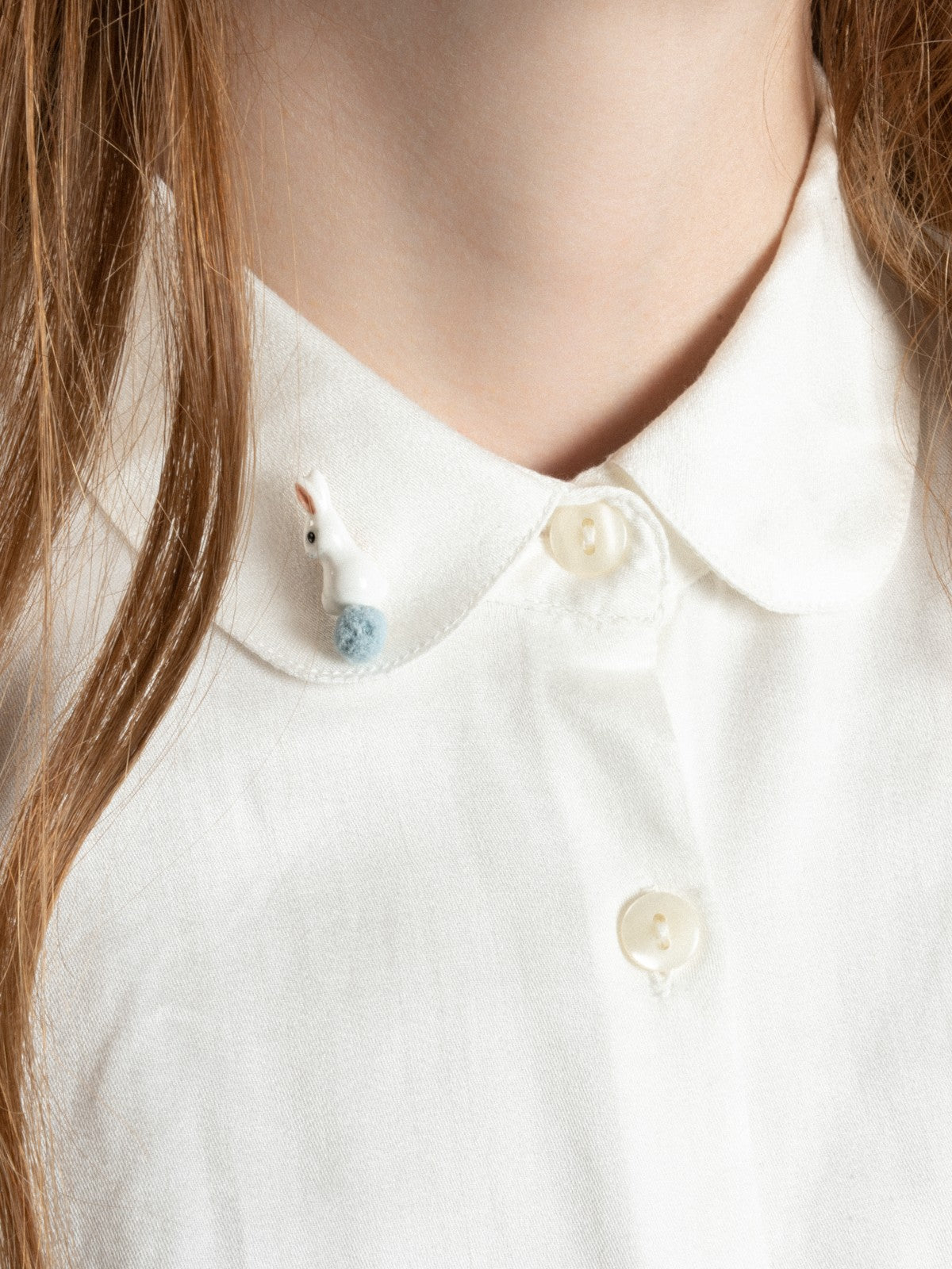 Pin's lapin avec pompon